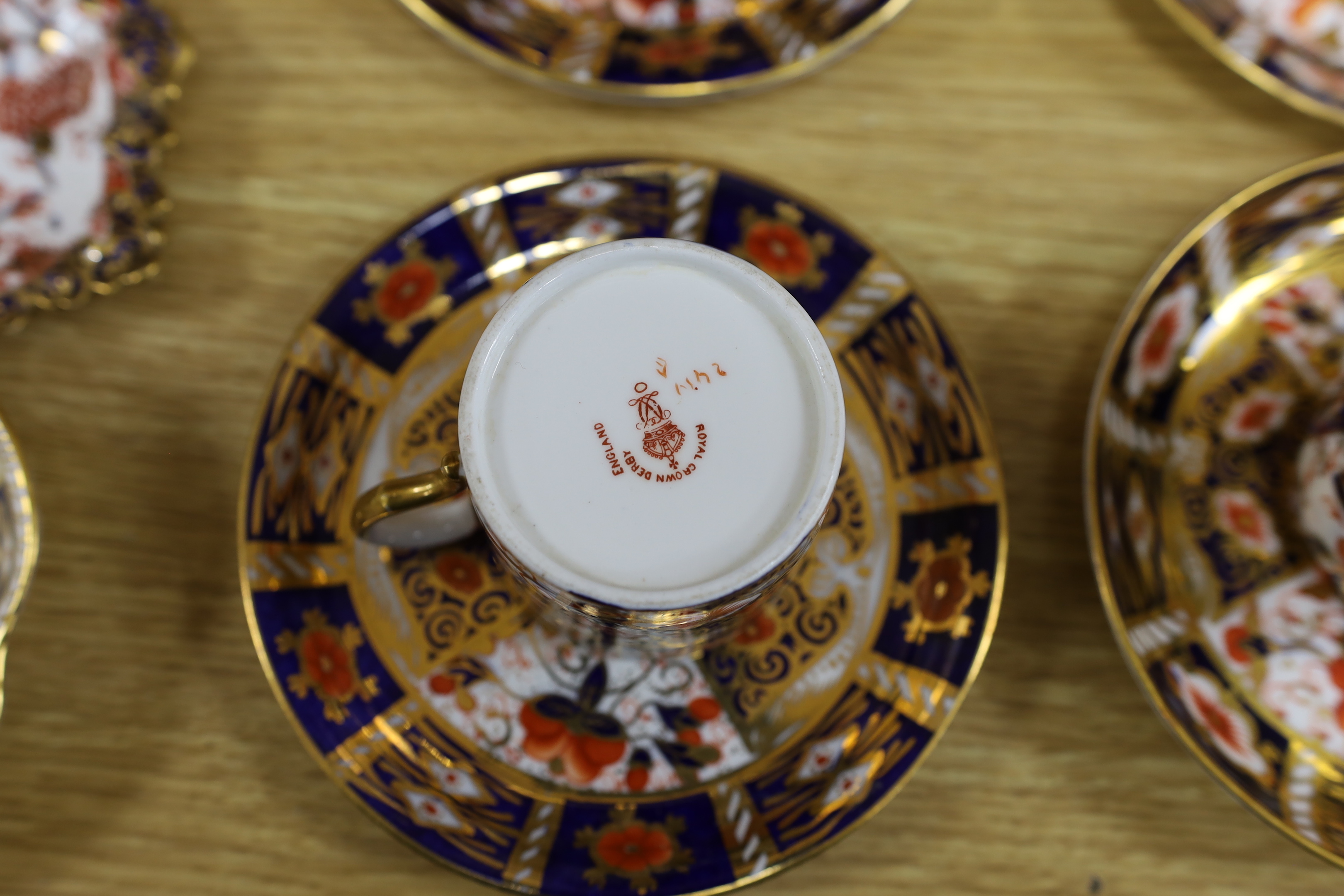 Royal Crown Derby and other Imari pattern tea ware including vases, sandwich plates and trios, several areas of damage